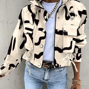 Cow print women's cropped jacket in white, featuring long sleeves, tailored waist, and urban streetwear style, size XL.