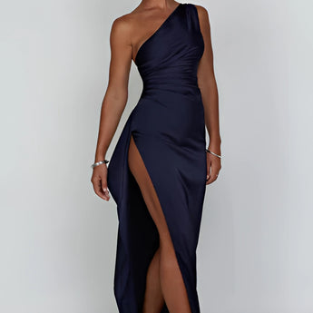 
Marine blue satin evening dress with a cowl neck and backless design, featuring a fitted sheath silhouette and sleeveless style in a 2XL size.