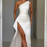 Ivory cowl neck backless satin evening dress in size 2XL, featuring a flowing one-piece design with a focus on elegance and formal wear. Model showcases hairstyle complementing the neckline, emphasizing the dress's sleek silhouette and sophisticated appearance.