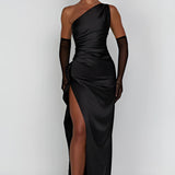 Cowl Neck Backless Satin Evening Dress in Nero, shown in size 2XL, featuring a sleek sheath silhouette with a flowing texture, designed for formal occasions. The model is wearing the dress, highlighting its elegant cowl neckline, sleeveless cut, and backless design, with focus on waist and thigh details.