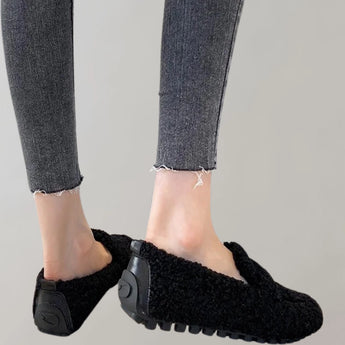 Light grey Cozy Fleece Slippers designed for women, featuring a soft plush exterior and anti-slip soles.