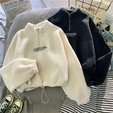 Cozy Teddy Fleece Half-Zip Pullover in warm blue color featuring a soft sherpa texture, long sleeves, and a stylish half-zip collar design.