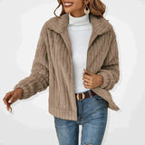 Cozy Women's Fleece Teddy Bear Jacket in ivory, featuring a sherpa-lined design perfect for winter fashion. The jacket has a high collar, long sleeves, and is styled with a smile.
