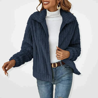 Cozy Women's Fleece Teddy Bear Jacket in Blu Navy color, Sherpa lined for winter fashion, featuring a smiling woman wearing the jacket with visible shoulder, arm, neck, sleeve, and waist details, highlighting the collar and overall warm, stylish design.