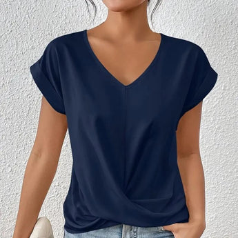 Elegant cream blouse with short sleeves and a tailored fit, designed for women in an XL size. The blouse features a stylish neckline and provides a sophisticated look suitable for both work and casual settings.