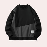 Unisex minimalist casual pullover in black, size XL, featuring a cream crewneck sweatshirt design with long sleeves, showcasing a simple logo pattern.