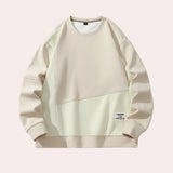 Unisex khaki crewneck sweatshirt in XL, displaying a minimalist casual design with long sleeves and a simple collar.
