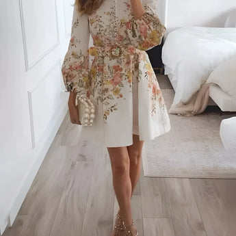 Cream floral high neck mini dress with balloon sleeves in white, featuring a chic spring style. The dress is designed with a fitted waist and elegant long sleeves, suitable for a 3XL size.