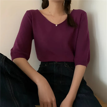 Elegant cream three-quarter sleeve V-neck blouse suitable for business and casual wear, displayed in a purple color and one size.