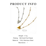 Dainty 18K Gold Heart Pendant Necklace displayed on a white background with delicate floral accents.