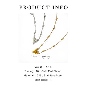Dainty 18K Gold Heart Pendant Necklace displayed on a white background with delicate floral accents.