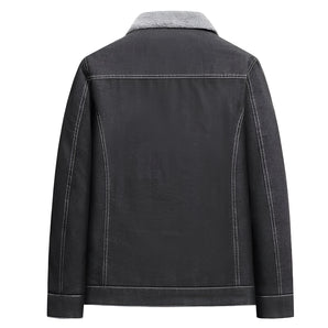 Men's dark denim jacket featuring a shearling collar, long sleeves, and stylish details suitable for winter wear.