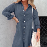 Dark blue denim mini dress with an oversized fit, featuring belted waist, puffed sleeves, and shirtdress style, displayed in size 3XL.