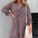 Denim mini dress with a belted waist, oversized fit, and puffed sleeves in a shirtdress style, shown in a Viola color and 3XL size. The image may include accessories such as sunglasses.