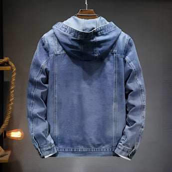 Men's distressed light wash hooded denim jacket featuring long sleeves, a button-up front, and a relaxed streetwear style.