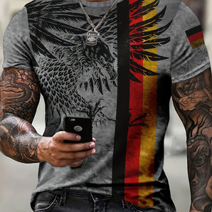 A person wearing a black t-shirt featuring an eagle graphic with the German flag, showcasing bold patriotic urban streetwear style, with visible sleeves, shoulder, and part of the neck.