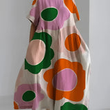 Eco-friendly oversized floral dress in white with green leaf print, featuring pink accents, designed for plus-size fashion with 4XL fit.
