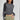 Dark gray women's cropped long sleeve crew neck top in XL size, featuring a comfortable fit with emphasis on the neckline, shoulders, and sleeves.
