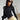 Electric blue women's cropped long sleeve crew neck top in a Nero color, size XL, displayed on a mannequin showing arm and shoulder details.