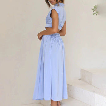 Elegant black midi dress with a stylish back cutout, featuring a fitted waist and short sleeves, perfect for formal evening events.
