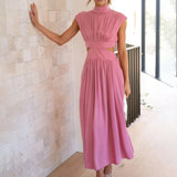 Elegant black midi dress with a stylish back cutout, featuring a form-fitting silhouette, short sleeves, and a round neckline, perfect for evening wear. The dress is displayed in a rose hue and XL size.