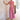 Elegant black midi dress with a stylish back cutout, featuring a form-fitting silhouette, short sleeves, and a round neckline, perfect for evening wear. The dress is displayed in a rose hue and XL size.