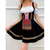 Elegant backless black velvet skater dress with an embroidered hem and white cuffs, shown in size 4XL.