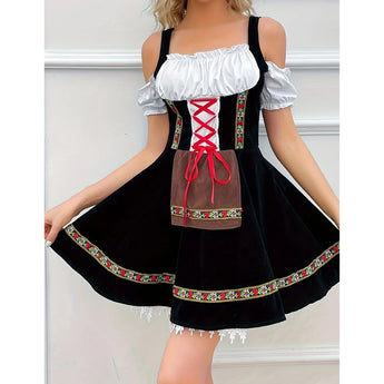 Elegant backless black velvet skater dress with an embroidered hem and white cuffs, shown in size 4XL.