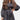 Elegant black satin wrap dress with long sleeves, featuring a mini length and cinched waist, suitable for party wear.