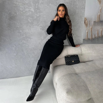 Elegant beige turtleneck midi dress featuring long sleeves and a fitted silhouette, suitable for chic fall office wear.