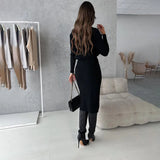 Elegant beige turtleneck midi dress featuring long sleeves and a fitted waist, designed for chic fall office wear. The dress falls to knee length, offering a comfortable and stylish look.