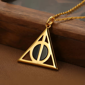 Elegant Black Agate Deathly Hallows Gold Pendant Necklace, copper plated gold, showcasing an amber triangle design with symbolic elements.
