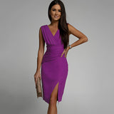 
Elegant black cocktail dress featuring a sleeveless V-neck wrap design, knee-length style, worn by a model showcasing the Viola color in 3XL size.