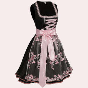 Elegant black floral dirndl dress featuring a pink ribbon, with a fitted bodice, short sleeves, and a V-neck collar, ideal for Oktoberfest.