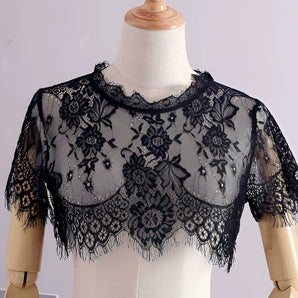 Elegant black floral lace semi-sheer blouse with vintage-inspired design, showcasing long sleeves and a delicate lace pattern around the neck and shoulders, tailored for an XL size.