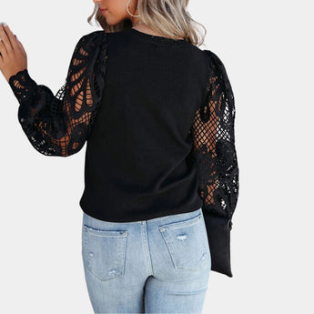 Elegant black lace sleeve sweater for women, featuring intricate lace detailing on the sleeves, a stylish neckline, and designed for fall fashion.