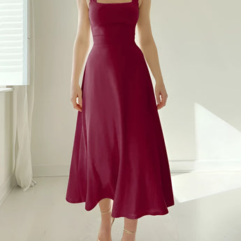 Elegant black midi dress with a square neck and sleeveless design, featuring pockets, displayed in a red wine color, size 3XL.