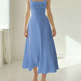 Elegant blue midi dress in size 3XL featuring a square neck, sleeveless design, and convenient pockets, styled for a fashionable and comfortable fit.
