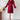 Elegant black pleated long sleeve mini dress with a fitted waist and knee-length hem, designed for an office chic look.