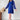 Elegant blue pleated long sleeve mini dress styled for an office chic look, worn by a model.