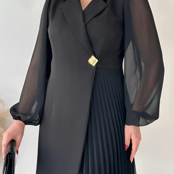Elegant black pleated long sleeve mini dress suitable for office wear, featuring a fitted waist and a chic design.
