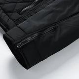 Luxurious black silk fabric with a smooth, glossy texture, draped elegantly to showcase its sheen and fluidity.