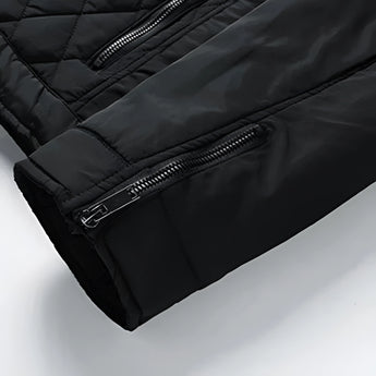 Luxurious black silk fabric with a smooth, glossy texture, draped elegantly to showcase its sheen and fluidity.