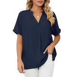 Elegant black V-neck linen blouse for women, shown in marine blue color, 2XL size, modeled on a person with a casual summer look.