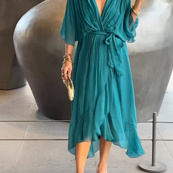 Elegant blue-green V-neck wrap midi dress in size 5XL, featuring short sleeves and a flattering waistline, ideal for a stylish summer look.