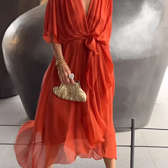 Elegant orange V-neck wrap midi dress in size 5XL, showcasing stylish short sleeves and a flattering silhouette. The dress is designed as a women's summer essential, perfect for formal events and special occasions.