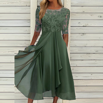 Green elegant lace top evening dress with a high-low skirt, designed with a one-piece garment style, featuring short sleeves and a round neckline.