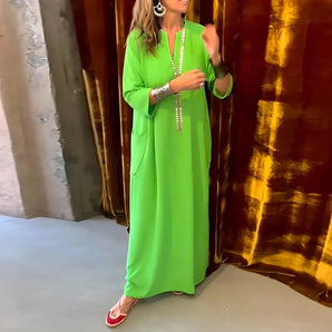 Elegant bright green long sleeve maxi dress in size 3XL, designed for women's evening wear; features a fitted waist and formal gown style, suitable for special events.
