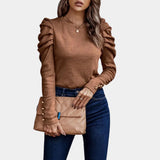 Elegant orange ruched sleeve sweater with slim fit and puffed shoulders, featuring a stylish collar and fashionable design.