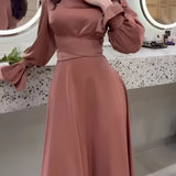 Elegant copper satin evening gown featuring a belted waist and puffed sleeves in a coffee color, size 2XL. The dress showcases a sophisticated fashion design suitable for special occasions.